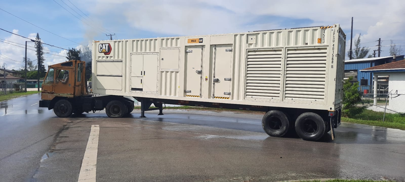 Trailer transporting rental generator units in Central Andros