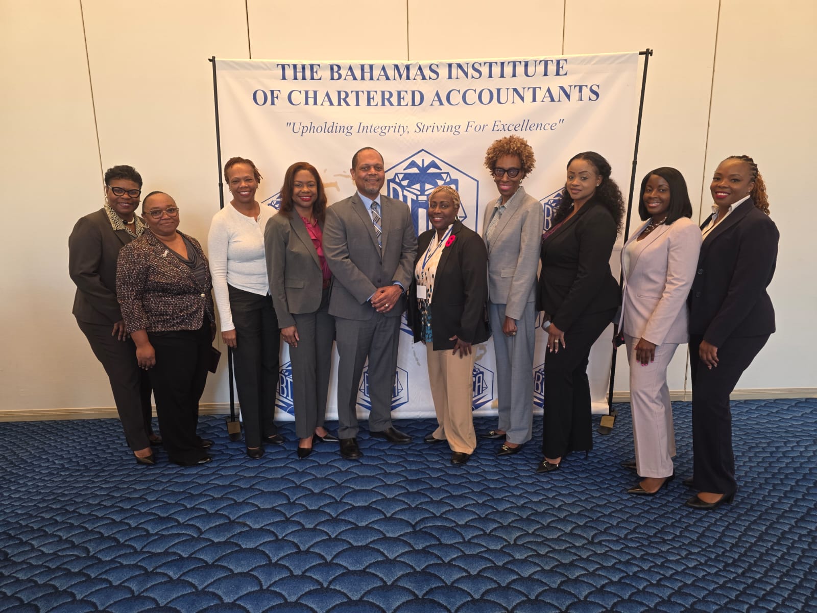 BPL COO Anthony Christie (center) with Audit Director Chantal Williams, CFO Chandrice Ferguson, and other BPL team members at BICA Accountants Week Seminar