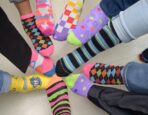 BPL Rocks Its Socks In Support of World Down Syndrome Day
