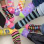 BPL Rocks Its Socks In Support of World Down Syndrome Day