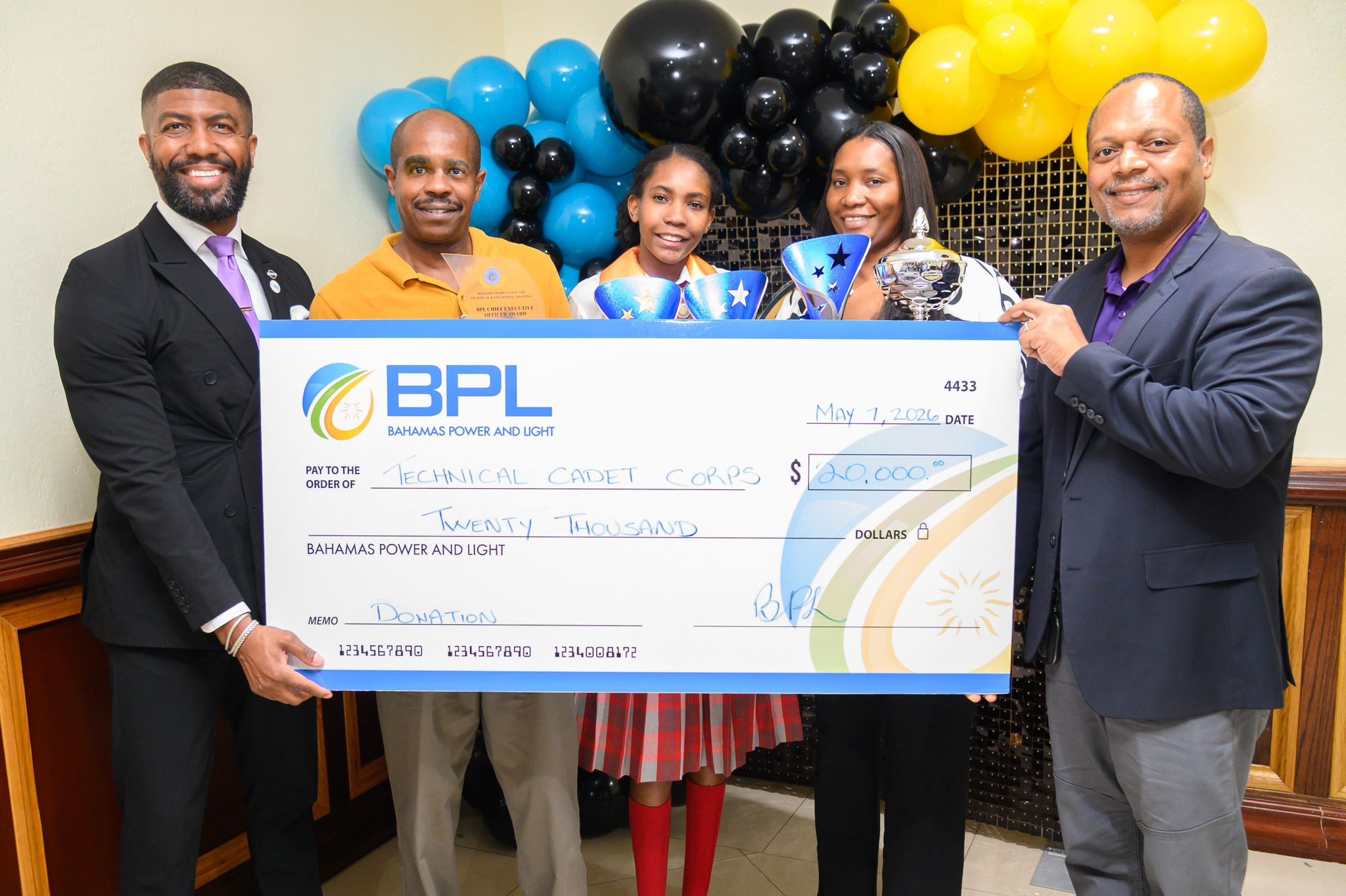 L-R, BPL Director of Communications - Theodore Sealy, Awardee’s Father - Terence Welch, Awardee - Terenique Welch, Awardee’s Mother - Lashawndel Thurston, BPL COO - Anthony Christie